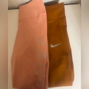 2 pairs of Nike leggings